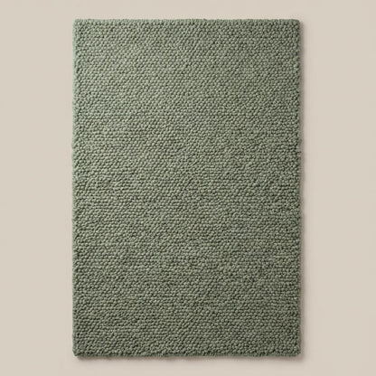 Chunky loop textured sage green rug with thick cozy loops and soft minimalist design