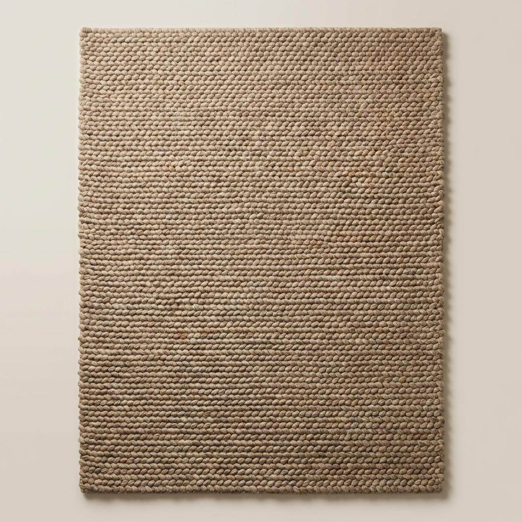 Chunky wool area rug in thick beige handwoven texture for cozy living room flooring