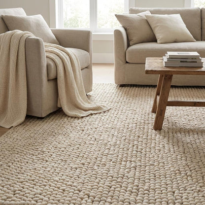 Chunky wool loop rug in cream with thick, textured oversized yarn loops for cozy, modern organic decor