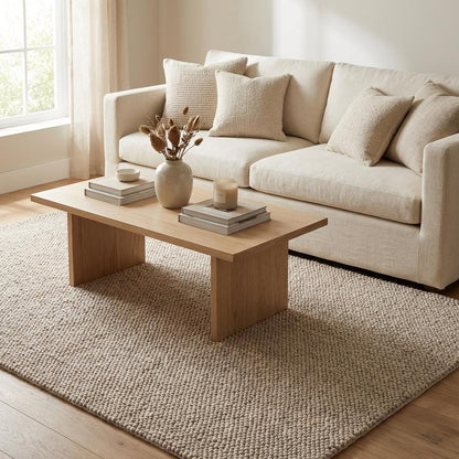 Handwoven chunky wool loop rug in neutral beige with thick texture for cozy modern Scandinavian decor