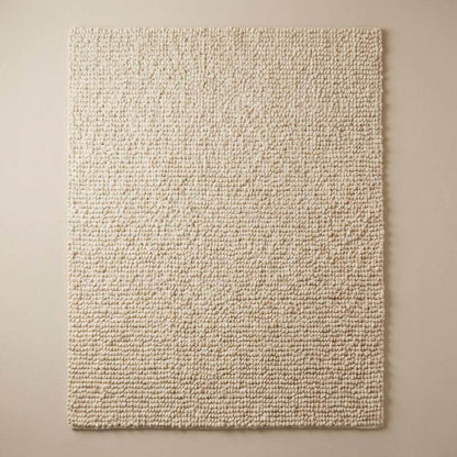 Chunky wool pebble rug with thick ivory textured loops for cozy modern living room