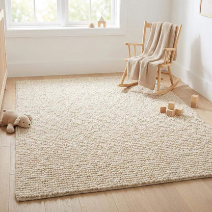 Chunky wool pebble rug with thick ivory textured loops for cozy modern living room ambiance