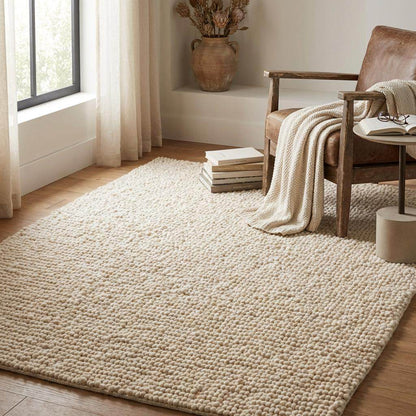 Chunky wool pebble rug with thick ivory textured loops for cozy modern living room decor