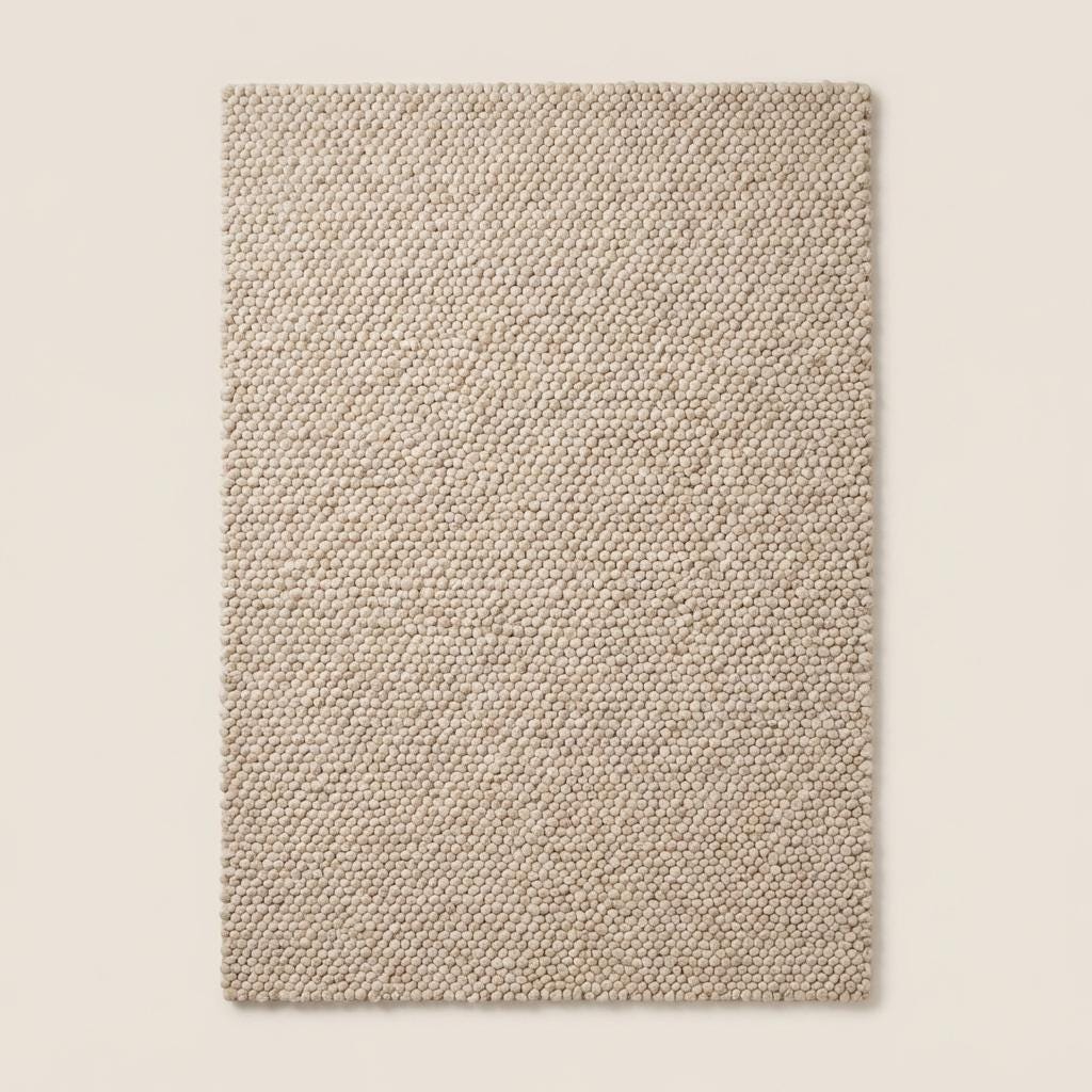 Handmade chunky wool rug with cream thick loop pile, cozy boho textured area carpet