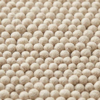 Chunky wool rug handwoven cream textured neutral Scandinavian modern area rug