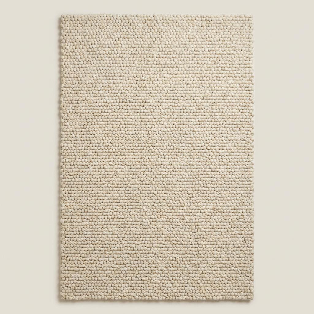 Handwoven chunky wool rug with cream thick loop pile, perfect for cozy modern farmhouse and Scandinavian decor