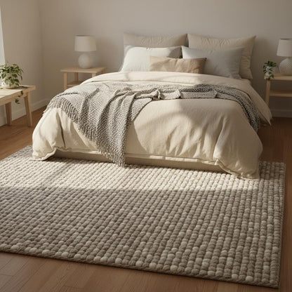 Neutral handmade wool rug with thick cozy fibers perfect for Scandinavian or boho home décor.