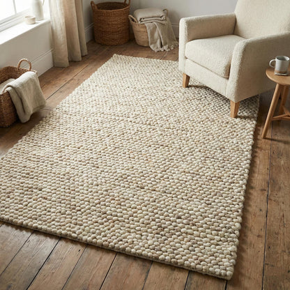 Handwoven chunky wool rug with neutral tones for Scandinavian and modern farmhouse decor