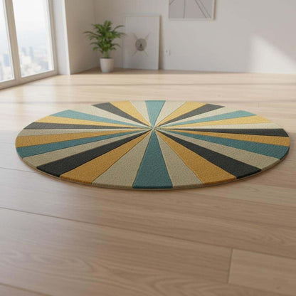 Round geometric rug with hand tufted starburst pattern in mustard, teal, and gray wool