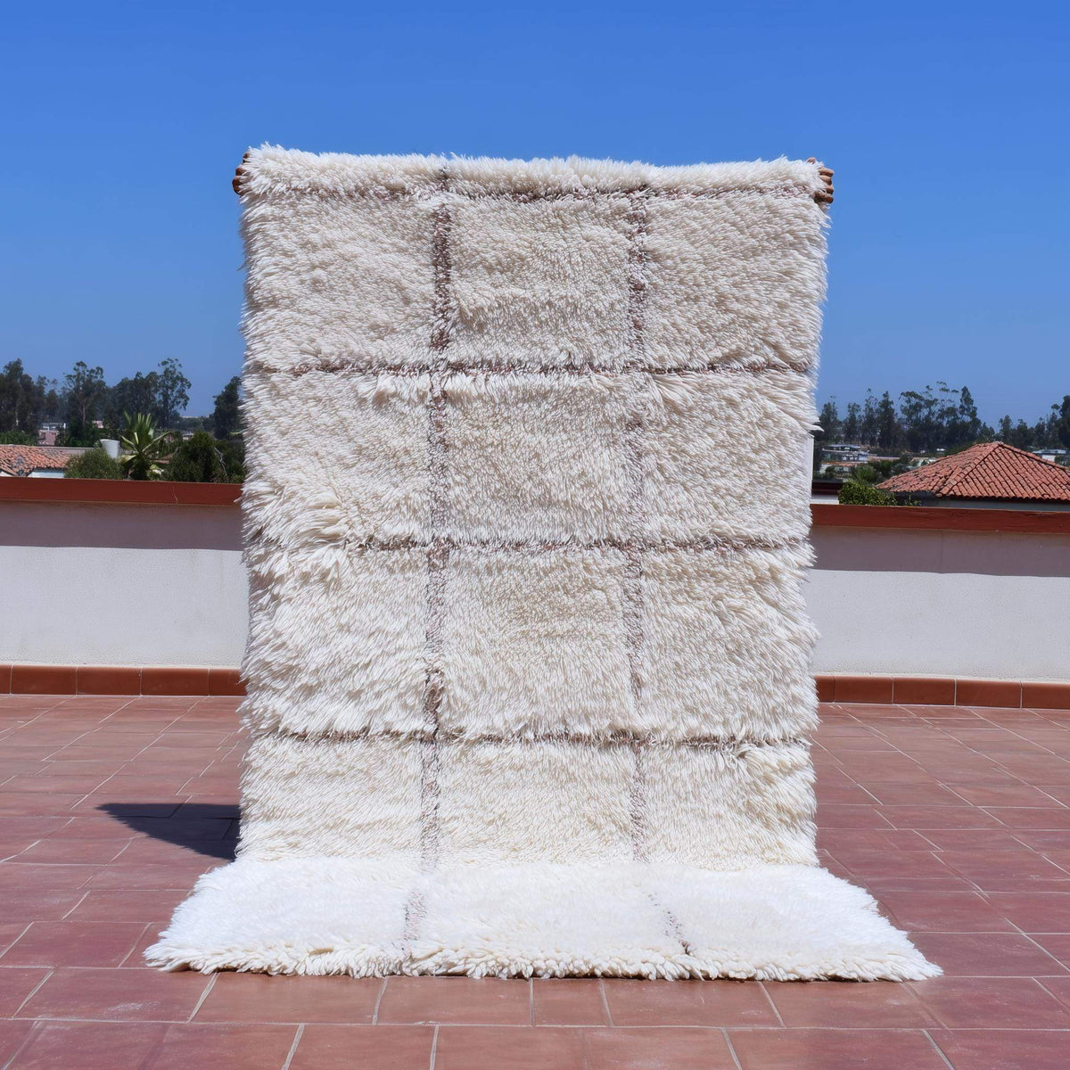Cream Moroccan shag rug with handwoven Berber grid pattern and plush high pile for cozy boho home decor