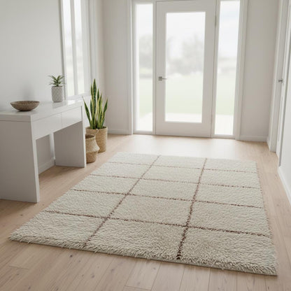 Cream Moroccan shag rug with handwoven Berber grid pattern and plush high pile fibers