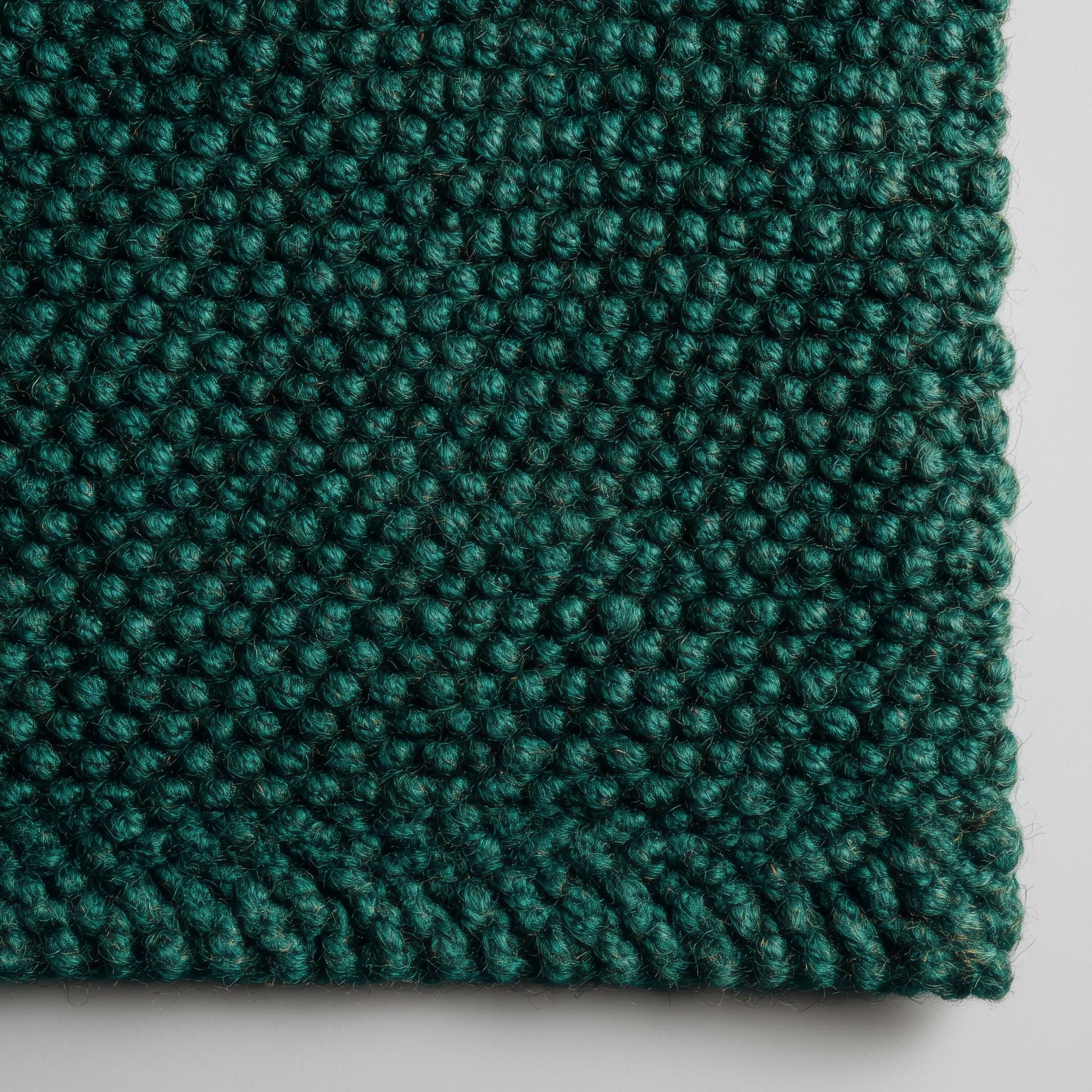 Dark green chunky wool rug with pebble texture, handmade thick wool area carpet for cozy modern boho living room decor