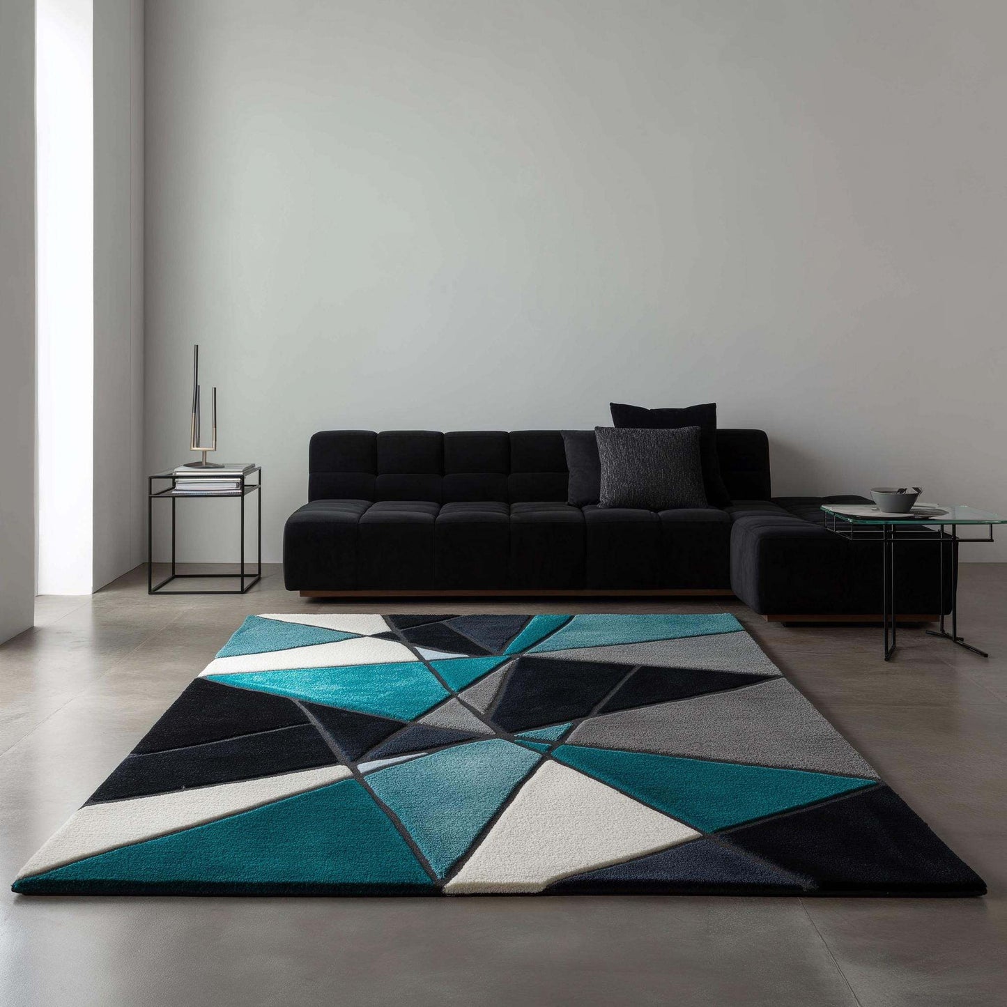 Deep teal area rug with hand tufted plush geometric pattern in deep teal, blue, and ochre, durable poly-blend material, modern abstract carpet design.