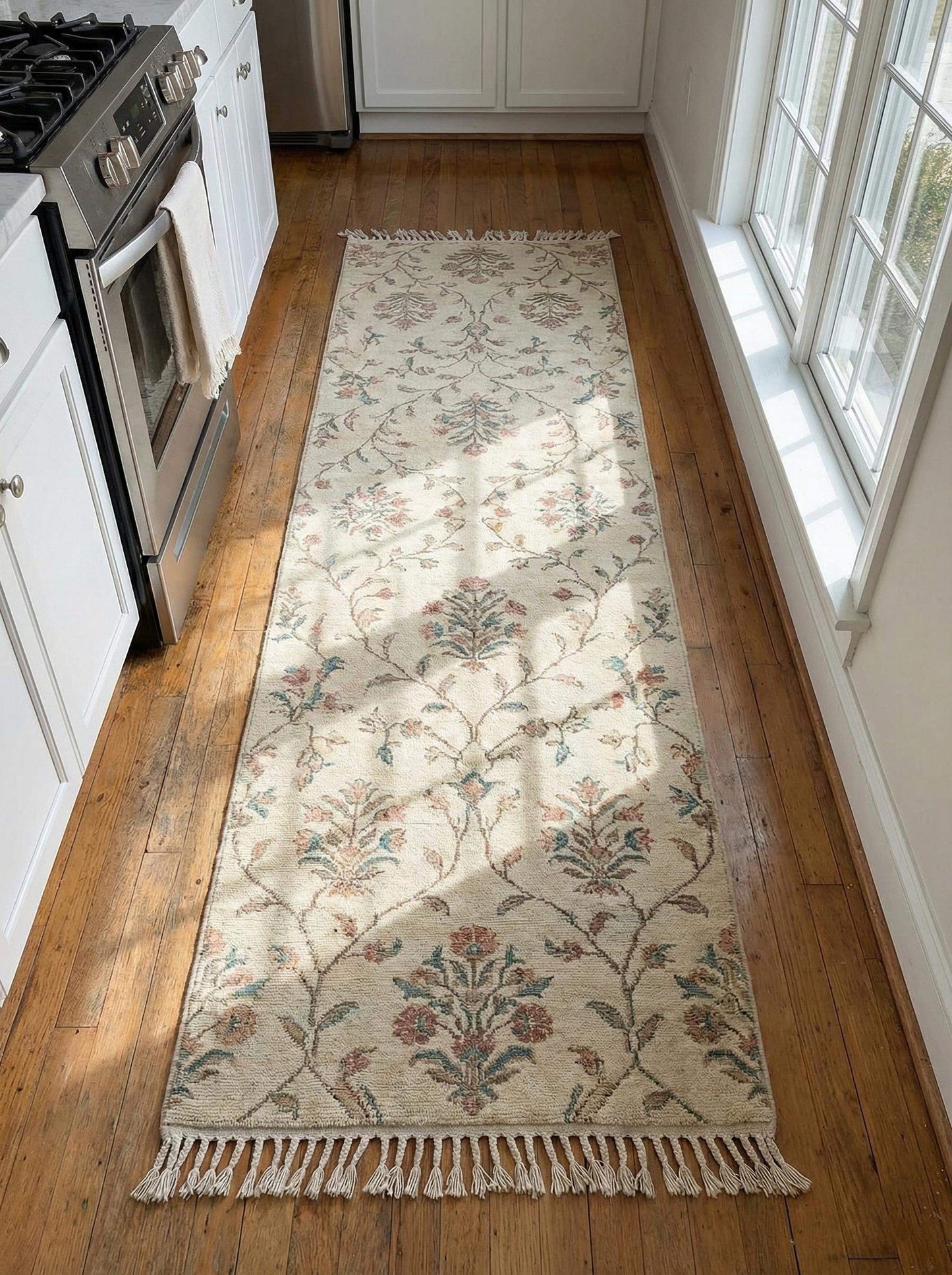 Floral hand knotted runner rug with ivory base and sage rose floral vine pattern for kitchen hallway decor