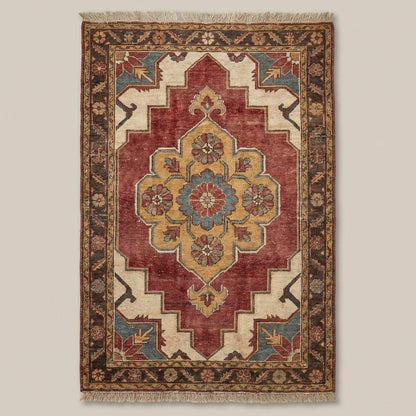 Hand knotted wool floral medallion area rug with traditional Indo-Persian design and rich brick red, ivory, and gold accents
