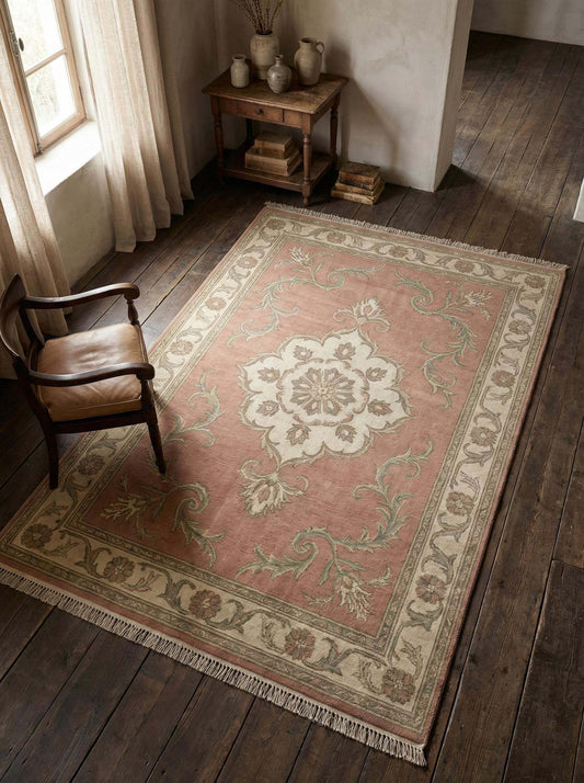 Soft pink floral medallion hand knotted wool rug with ivory tones for living rooms and bedrooms