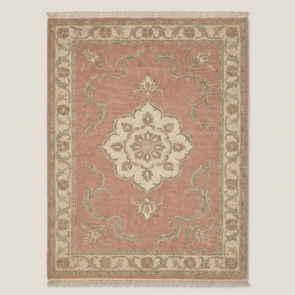 Floral hand knotted rug styled in living room with wooden floor and neutral furniture
