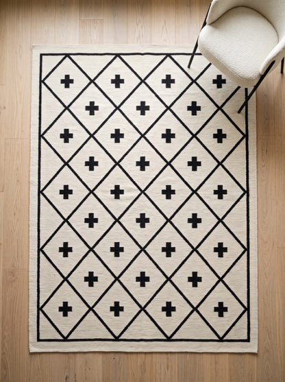 Southwestern Flatweave Wool Rug in ivory wool with a black diamond lattice, Swiss cross motifs and slim border