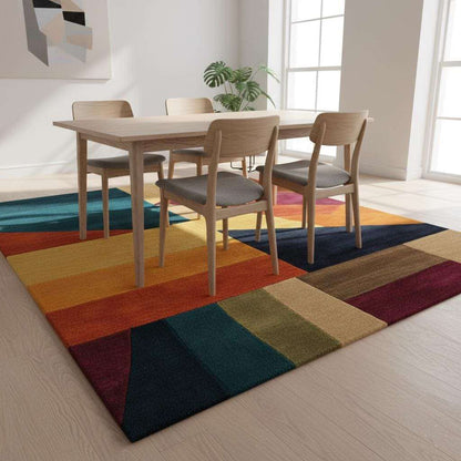 Colorful geometric area rug with triangle patchwork pattern and plush wool blend texture