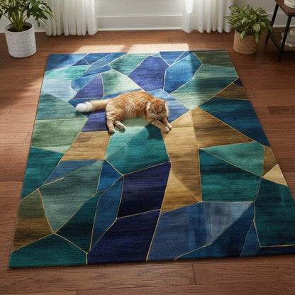 Geometric abstract rug with blue, teal, gold, and emerald stained glass design
