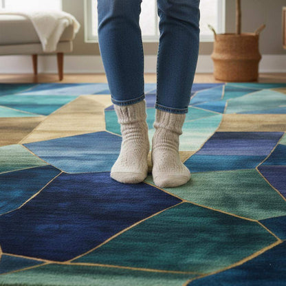 Geometric abstract rug with blue, teal, gold stained glass design, modern area carpet