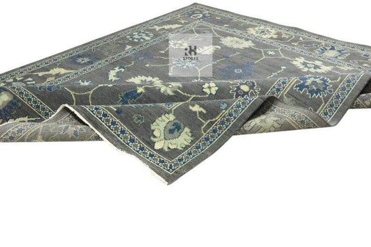 Hand Knotted Oushak Wool Rug with traditional floral design in muted gray, peachy orange, blue, green, and cream tones, 8x10 area rug