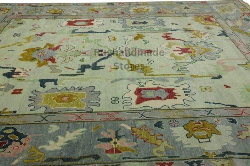 Hand-knotted Oushak wool rug with blueish green floral design, 8x10 Turkish vintage area rug