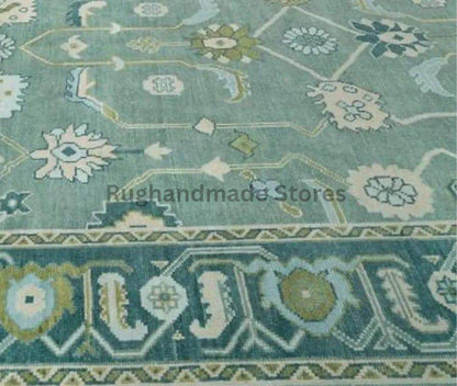 Hand-knotted Oushak wool rug with vintage Turkish floral design in green and blueish green for living room decor