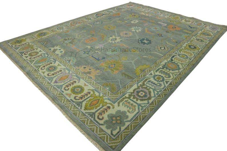 Hand-knotted Oushak wool rug with vintage Turkish floral design in green and blueish tones for living room décor