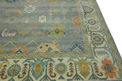 Hand-knotted Oushak wool rug with vintage Turkish floral design in green and blueish-green, 8x10 area rug for living room decor