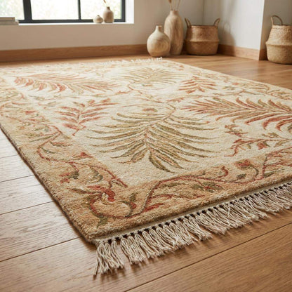 Close-up of the natural cotton fringe ends, showing the authentic extension of the rug's warp threads typical of hand-knotted construction.