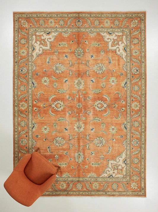 Hand-knotted wool Oushak rug in terracotta burnt orange with traditional design and natural vegetable dyes
