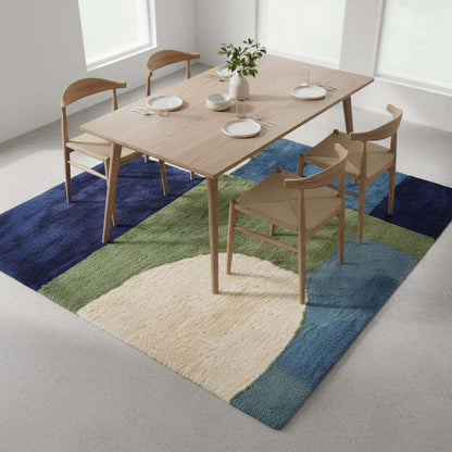 Hand tufted rug with mid-century modern geometric blue and green wool design