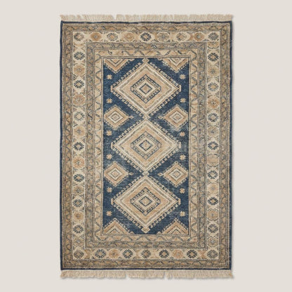 Traditional blue and ivory hand knotted rug with diamond geometric pattern and artisan detailing