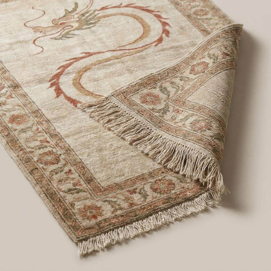 Close-up texture of handmade wool rug showing low pile hand-knotted construction and soft artisan fibers __etsy:8110165403