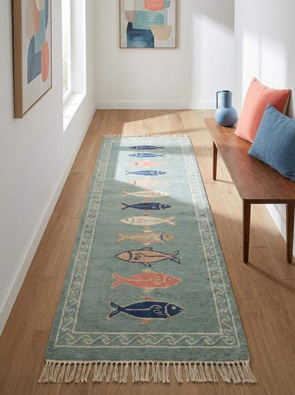 Handmade nautical runner rug with multicolor fish pattern on green background for beach house interiors __etsy:7924469589