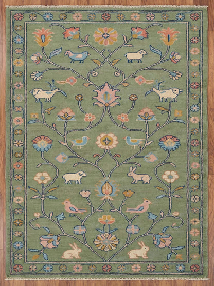 Hand knotted floral area rug with sage green wool and animal motifs for traditional living room decor