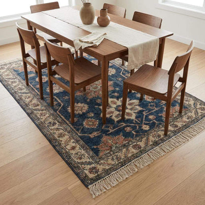 Hand knotted blue Oushak rug with floral motifs in vintage wool design
