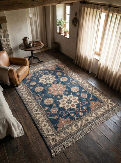 Hand knotted Oushak wool area rug with blue floral medallion pattern in living room setting __etsy:7663824798