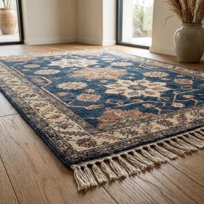 Blue hand knotted Oushak rug with vintage floral design in wool for living room