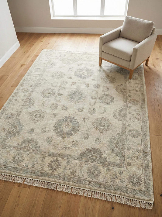 Hand knotted Oushak area rug with neutral floral wool design for living room