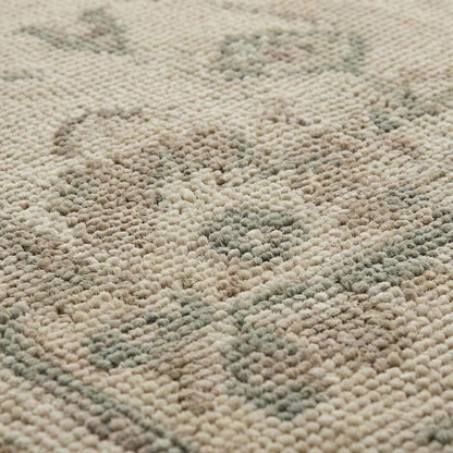 Close up of hand knotted wool rug showing low pile texture and individual knot structure
