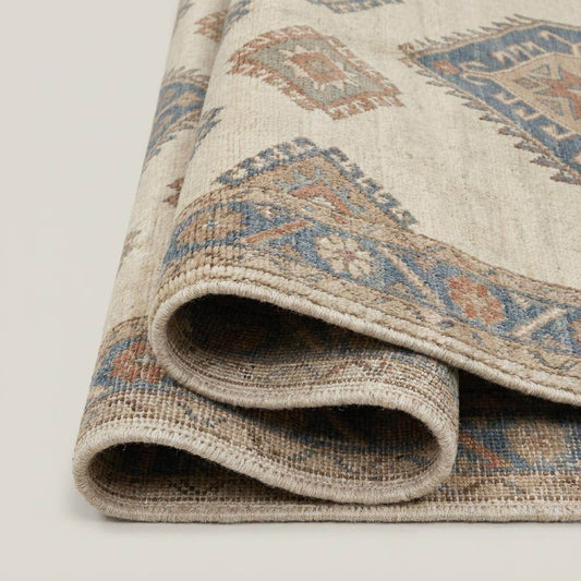 Close-up of hand knotted wool rug showing fine knot detail, soft texture, and natural fiber craftsmanship __etsy:7938449896