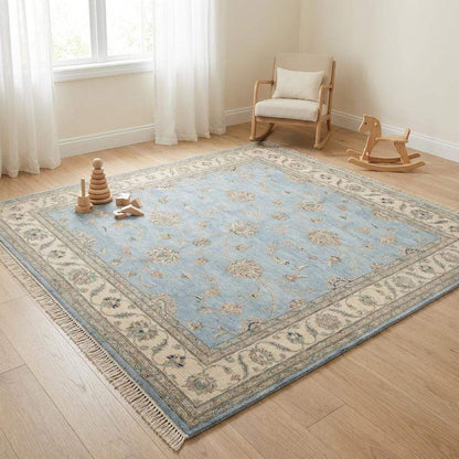 Detail of traditional fringe edging on handmade wool carpet.