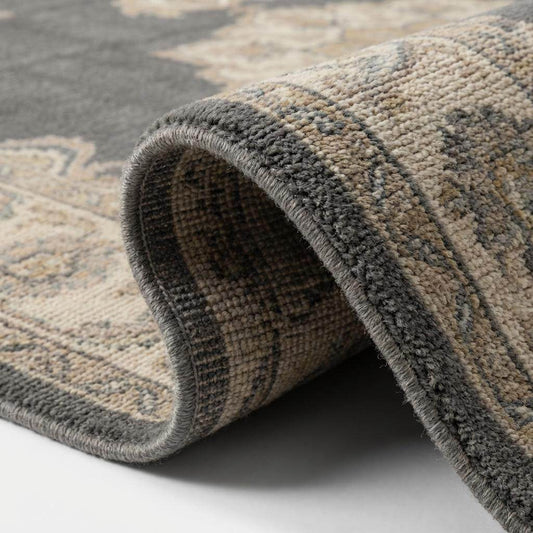 Close up detail of hand knotted wool pile showing dense weave structure and soft grey texture. __etsy:7645808554