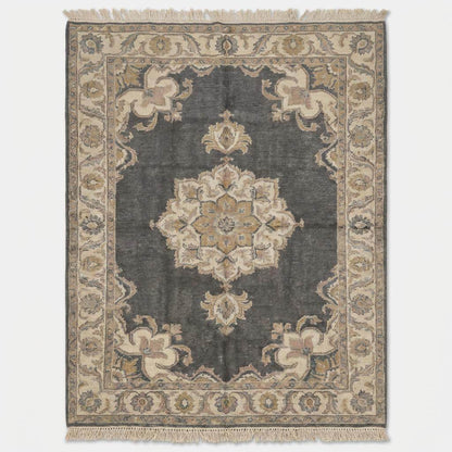 Side angle of traditional grey turkish rug showing fringe detail and muted color palette. __etsy:7693759793