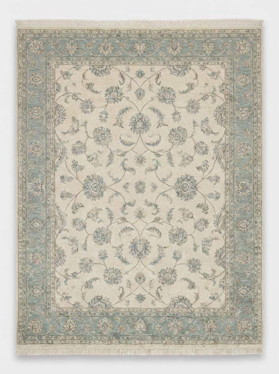 Neutral hand knotted wool rug complementing minimalist Scandinavian interior décor