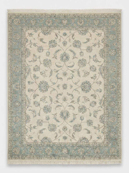 Neutral hand knotted wool rug complementing minimalist Scandinavian interior décor