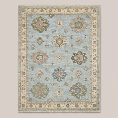 Traditional Turkish inspired Oushak area rug featuring soft blue field and floral medallions with decorative border __etsy:8085161034