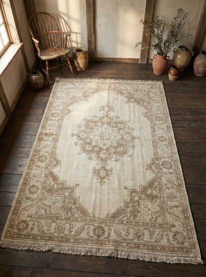 Hand knotted Oushak rug in neutral beige with vintage Persian medallion design, handmade wool area rug for living room